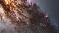 Resembling looming rain clouds on a stormy day, dark lanes of dust crisscross the giant elliptical galaxy NGC 5128, also known as Centaurus A. The warped shape of NGC 5128’s disk of gas and dust is evidence for a past collision and merger with another galaxy. The resulting shockwaves cause hydrogen gas clouds to compress, triggering a firestorm of new star formation. At a distance of just over 11 million light-years, NGC 5128 contains the closest active galactic nucleus to Earth. The center is home for a supermassive black hole that ejects jets of high-speed gas into space, but neither the supermassive black hole or the jets are visible in this image. Image credit: NASA / ESA / Hubble Heritage / STScI / AURA / Hubble Collaboration / R. O'Connell, University of Virginia / WFC3 Scientific Oversight Committee.