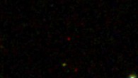 This image shows SDSS J0100+2802 (center), the brightest quasar in the early Universe. Image credit: Sloan Digital Sky Survey.