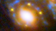 This image shows four different images of SN Refsdal whose light has been distorted and magnified by the massive galaxy cluster MACS J1149+2223 in front of it. The huge mass of the cluster and one of the galaxies within it is bending the light from a supernova behind them and creating four separate images of the supernova. The light has been magnified and distorted due to gravitational lensing and as a result the images are arranged around the elliptical galaxy in a formation known as an Einstein cross. Image credit: NASA / ESA / S. Rodney, JHU / FrontierSN team / T. Treu, UCLA / P. Kelly, UC Berkeley / GLASS team / J. Lotz, STScI / Frontier Fields team / M. Postman, STScI / CLASH team / Z. Levay, STScI.