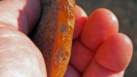 Agate stone flake tool found beneath the volcanic ash at the Rimrock Draw Rockshelter, Riley, Oregon. Image credit: University of Oregon.