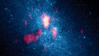 This Hubble Space Telescope image shows the local dwarf galaxy NGC 5253; superimposed is the gas (fuzzy red to yellow) as seen by the Submillimeter Array; the bright white area is Cloud D. Image credit: J. L. Turner et al.