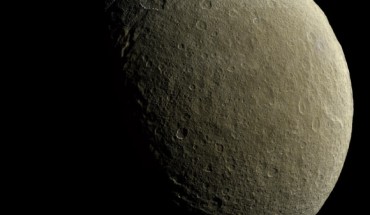 This mosaic image from the NASA/ESA/ASI Cassini-Huygens spacecraft is centered at 9 degrees north latitude, 254 degrees west longitude. The image was acquired at a distance of about 57,800 km from Rhea. This image represents one of the highest resolution color views of the icy moon released to date, and consists of multiple images from Cassini’s narrow-angle camera (NAC) with data from the wide-angle camera used to fill in areas where NAC data was not available. Image credit: NASA / JPL-Caltech / Space Science Institute.