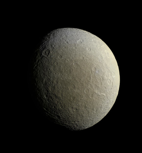 This mosaic image from Cassini-Huygens is centered at 21 degrees north latitude, 229 degrees west longitude. The image consists of multiple images from Cassini’s narrow-angle camera (NAC) with data from the wide-angle camera used to fill in areas where NAC data was not available. It was acquired at a distance of about 78,000 km from Rhea. Image credit: NASA / JPL-Caltech / Space Science Institute.