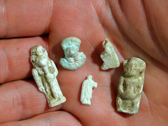 Faience amulets depicting Egyptian gods. Image credit: Clara Amit / Israel Antiquities Authority.