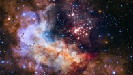 This image of the open star cluster Westerlund 2 and its surroundings has been released to celebrate Hubble’s 25th year in orbit. The image’s central region, containing the star cluster, blends visible-light data taken by the Advanced Camera for Surveys and near-infrared exposures taken by the Wide Field Camera 3. The surrounding region is composed of visible-light observations taken by the Advanced Camera for Surveys. Image credit: NASA / ESA / Hubble Heritage Team / STScI / AURA / A. Nota / Westerlund 2 Science Team.