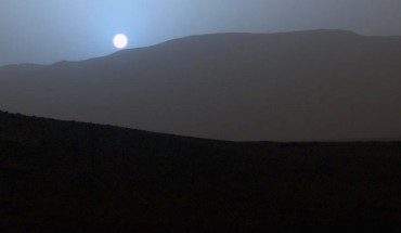 NASA’s Curiosity Mars rover captured this beautiful view of nightfall on the Red Planet on April 15, 2015. The red surface coloring of Mars is due to oxidized iron. At certain times of the Martian year, great dust storms occur; the large amounts of dust in the atmosphere during these storms absorb much of the incoming radiation from the Sun; this causes large temperature inversions in the Martian atmosphere. Image credit: NASA / JPL-Caltech / MSSS.