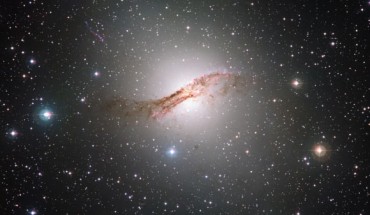 The giant elliptical galaxy Centaurus A (NGC 5128) is the closest such galaxy to the Earth, at a distance of about 12 million light-years. Image credit: ESO / ESA / Hubble / NASA / Digitized Sky Survey / Davide de Martin.