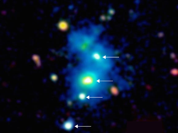 This image shows the quadruple quasar SDSS J0841+3921 (quasars are indicated by arrows). Image credit: Joseph Hennawi / Fabrizio Arrigoni-Battaia.