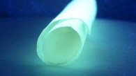 This transparent and photoluminescent nanocellulose paper could lead to sustainable, roll-up electronics. Image credit: American Chemical Society.