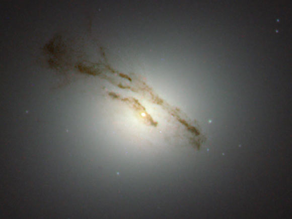 This image of Messier 84 does not show the whole galaxy but only its very interesting center, and is likely to be the best image of the region ever captured. Image credit: ESA / Hubble / NASA.