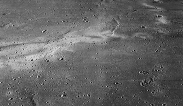 The Reiner Gamma formation is a well known lunar swirl region, due to its nearside location. Swirls are described by curving, diffuse bright patterns, which are interspersed with darker lanes. These anomalous albedo patterns are associated with local magnetic anomalies of varying intensities; swirl complexes are often extensive and may stretch across thousands of kilometers, well beyond localized magnetic anomalies. Image credit: NASA / LPI.