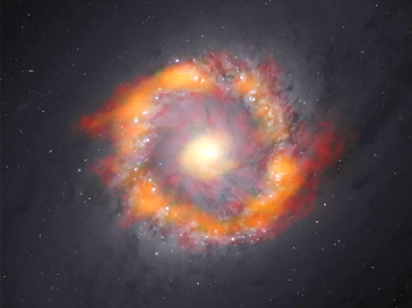 This composite image shows the barred spiral galaxy NGC 1097. By studying the motion of two molecules, astronomers were able to determine that the supermassive black hole at the center of this galaxy has a mass 140 million times greater than our Sun. Image credit: ALMA / NRAO / ESO / NAOJ / K. Onishi / NASA / ESA / Hubble Space Telescope / E. Sturdivant / AUI / NSF.