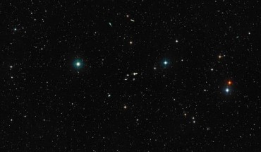This image shows a ground-based wide-field view of the region around HCG 16. Image credit: NASA / ESA / Digitized Sky Survey 2 / Davide De Martin.