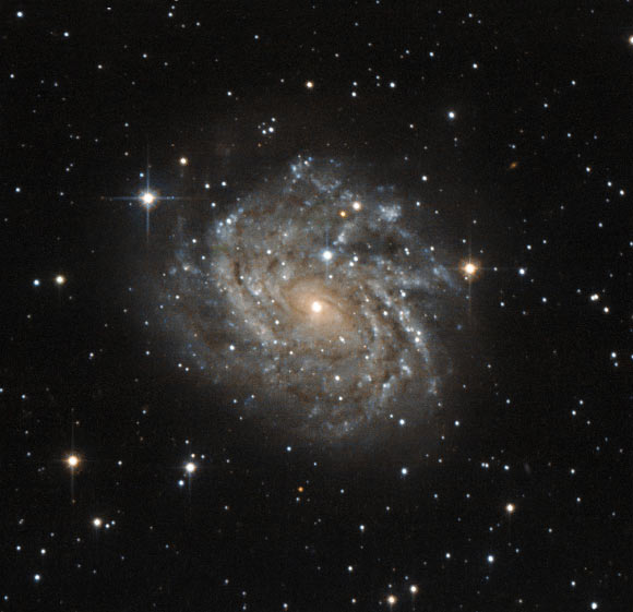 This image shows the Milky Way-like spiral galaxy LEDA 89996. Image credit: ESA / Hubble / NASA.