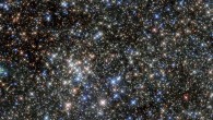 This new Hubble image shows a massive open star cluster known as the Quintuplet Cluster in infrared light. Image credit: ESA / Hubble / NASA.