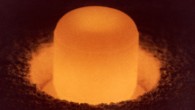 Plutonium-238 sphere under its own light. With a half-life of 89 years, plutonium-238 is being used in space applications requiring a power source with a long service life. Plutonium-238 has a relatively high heat production rate which makes it useful as a power source. Image credit: DoE.