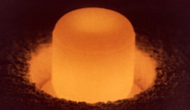 Plutonium-238 sphere under its own light. With a half-life of 89 years, plutonium-238 is being used in space applications requiring a power source with a long service life. Plutonium-238 has a relatively high heat production rate which makes it useful as a power source. Image credit: DoE.