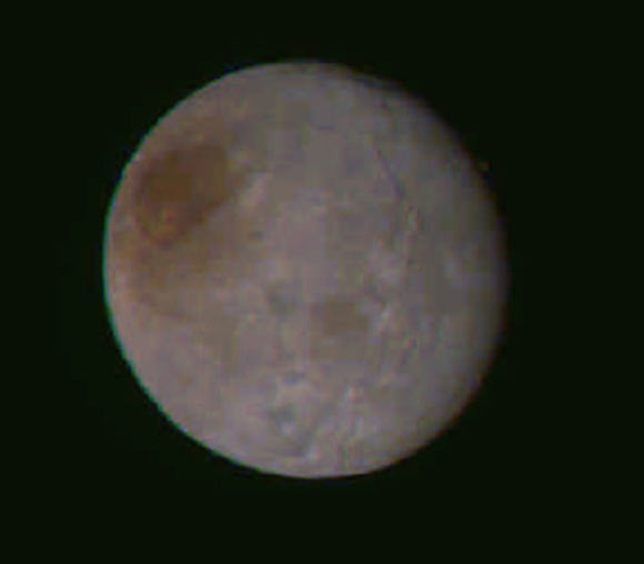 This image of Charon was taken at 2:49 a.m. EDT (06:49 a.m. GMT) on July 14. Image credit: NASA / Johns Hopkins University Applied Physics Laboratory / Southwest Research Institute.