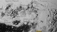 This image of the southern region of Sputnik Planum reveals icy plains, two mountain ranges, and a region where it appears that ancient, heavily-cratered terrain has been invaded by much newer icy deposits. The large crater is about 30 miles (50 km) wide. Image credit: NASA / Johns Hopkins University Applied Physics Laboratory / Southwest Research Institute.