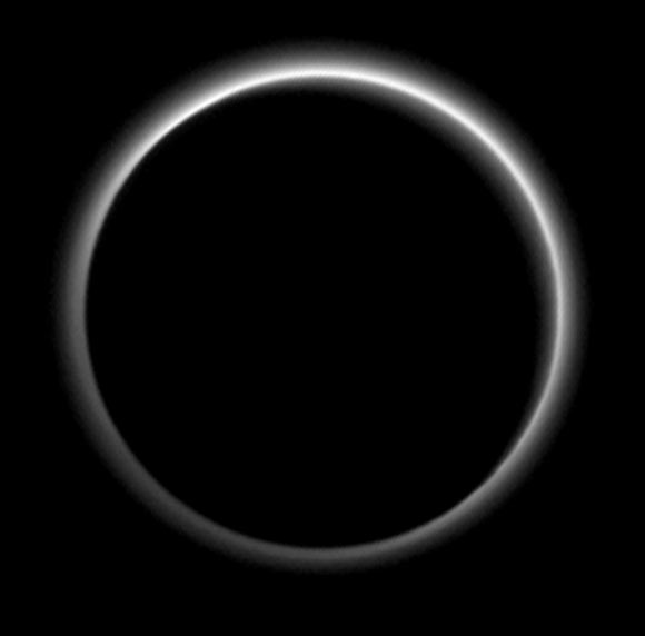 The atmosphere of Pluto rings its silhouette like a luminous halo in this image taken by New Horizons on July 15. This global portrait of the atmosphere was captured when the spacecraft was about 1.25 million miles (2 million km) from Pluto and shows structures as small as 12 miles across. The image, delivered to Earth on July 23, is displayed with north at the top of the frame. Image credit: NASA / Johns Hopkins University Applied Physics Laboratory / Southwest Research Institute.