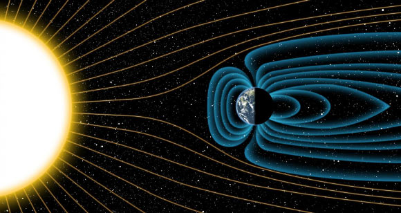 An artist’s depiction of Earth’s magnetic field deflecting high-energy protons from the Sun around 4 billion years ago. Image credit: Michael Osadciw / University of Rochester.