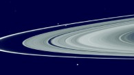 This composite image shows Saturn’s main rings, the F ring, and its shepherd satellites: the narrow F ring is located just outside of the outer edge of the main rings; slightly above and to the left of the center of the image are the shepherd satellites Prometheus (inner orbit) and Pandora (outer orbit). Image credit: NASA.