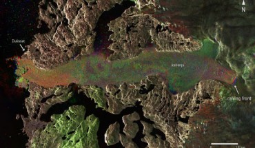 Jakobshavn glacier, also known as Sermeq Kujalleq and the Jakobshavn Isbræ, is a large glacier in West Greenland and is among the world’s most dynamic glaciers. Radar images from ESA’s Sentinel-1A captured the glacier before and after a massive calving event, which took place between 14 and 16 August 2015. The image composite includes different Sentinel-1A images from 27 July, and 13 and 19 August. The red, green and blue indicate the position of the calving front and other dynamic features on each respective date. Image credit: Copernicus Sentinel data /ESA.