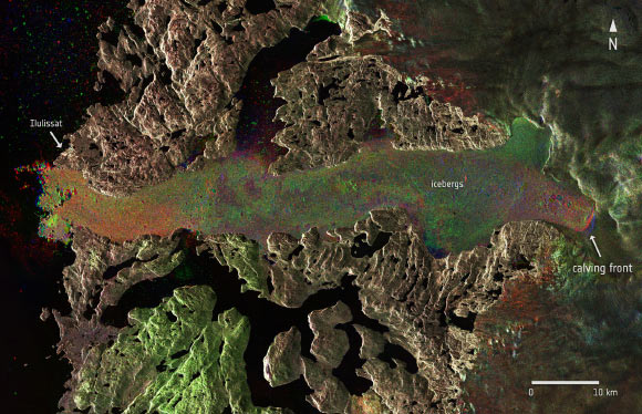 Jakobshavn glacier, also known as Sermeq Kujalleq and the Jakobshavn Isbræ, is a large glacier in West Greenland and is among the world’s most dynamic glaciers. Radar images from ESA’s Sentinel-1A captured the glacier before and after a massive calving event, which took place between 14 and 16 August 2015. The image composite includes different Sentinel-1A images from 27 July, and 13 and 19 August. The red, green and blue indicate the position of the calving front and other dynamic features on each respective date. Image credit: Copernicus Sentinel data /ESA.