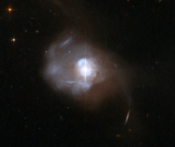 This Hubble image shows the extraordinary galaxy Markarian 231. Image credit: NASA / ESA / Hubble Heritage Team / STScI / AURA / Hubble Collaboration / A. Evans, University of Virginia, Charlottesville / NRAO / Stony Brook University.