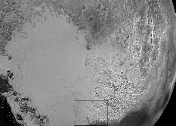 Sputnik Planum is the name of the smooth, light-bulb shaped region on the left of this composite of several New Horizons images of Pluto. The brilliantly white upland region to the right may be coated by nitrogen ice that has been transported through the atmosphere from the surface of Sputnik Planum, and deposited on these uplands. The box shows the location of the glacier detail images below. Image credit: NASA / Johns Hopkins University Applied Physics Laboratory / Southwest Research Institute.