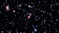 Vista Magellanic Clouds Survey view of the galaxy SAGE0536AGN (elliptical object in the center of the frame). Image credit: ESO / VISTA Magellanic Cloud Survey / Royal Astronomical Society.