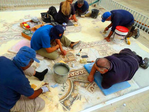 Workers of the Israel Antiquities Authority conserving the mosaic. Image credit: Nikki Davidov / Israel Antiquities Authority.