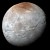 This impressive view of Charon was captured on July 14, 2015. Charon’s color palette is not as diverse as Pluto’s; most striking is the reddish north (top) polar region, informally named Mordor Macula. Image credit: NASA / Johns Hopkins University Applied Physics Laboratory / Southwest Research Institute.