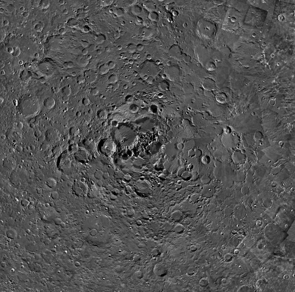 At the very center of this image from ESA’s SMART-1 orbiter is the north pole of the Moon. The image shows the characteristic craters of the Moon, present in all shapes and sizes. The largest in view is Rozhdestvenskiy, sandwiched between Hermite to the northeast and Plaskett to the southwest. Image credit: ESA / Space Exploration Institute / J. Manuel Fonseca, M. Costa & A. Mora, UNINOVA / B. Grieger & M. Almeida, ESA.