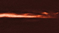 This image of part of an edge-on disk around AU Microscopii reveals wave-like features. Image credit: NASA / ESA / ESO / A. Boccaletti, Paris Observatory.