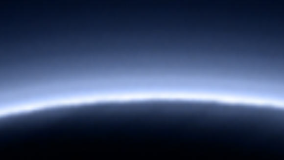 This photo is a close-up from the one above. According to NASA scientists, complex chemical compounds called tholins give Pluto a distinctive blue haze. Image credit: NASA / Johns Hopkins University Applied Physics Laboratory / Southwest Research Institute.
