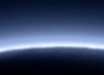 According to NASA scientists, complex chemical compounds called tholins give Pluto a distinctive blue haze. Image credit: NASA / Johns Hopkins University Applied Physics Laboratory / Southwest Research Institute.