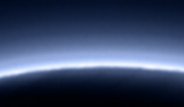 According to NASA scientists, complex chemical compounds called tholins give Pluto a distinctive blue haze. Image credit: NASA / Johns Hopkins University Applied Physics Laboratory / Southwest Research Institute.