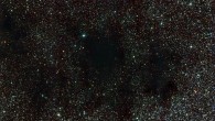 This image shows part of the Coalsack Nebula, an opaque interstellar dust cloud that obscures the light of the background Milky Way stars; dust grains in the cloud redden the starlight that reaches us by absorbing blue light preferentially. Image credit: ESO.
