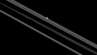 Although Mimas and Pandora, shown here, both orbit Saturn, they are very different moons. The shapes of moons can teach planetary scientists much about their history. This image was captured on July 26, 2015, when Cassini was nearly 904,000 miles (1.4 million km) from Mimas and 485,000 miles (781,000 km) from Pandora. Image credit: NASA / JPL-Caltech / Space Science Institute.