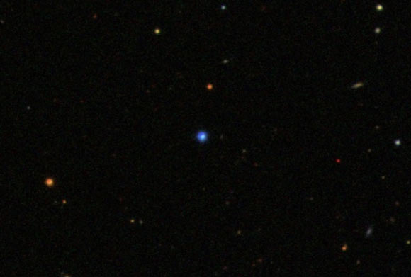 This image shows the white dwarf star WD 1145+017 (blue object in the center). Image credit: Sloan Digital Sky Survey.