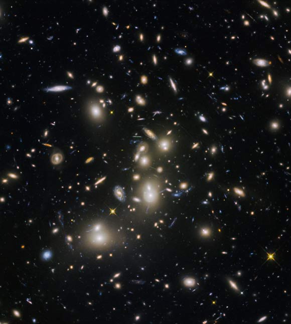 Abell 2744, nicknamed Pandora’s Cluster, was the first of six targets within the Frontier Fields program, which together have produced the deepest images of gravitational lensing ever made. The cluster is thought to have a very violent history, having formed from a cosmic pile-up of multiple galaxy clusters. Image credit: NASA / ESA / HST Frontier Fields Team / STScI.