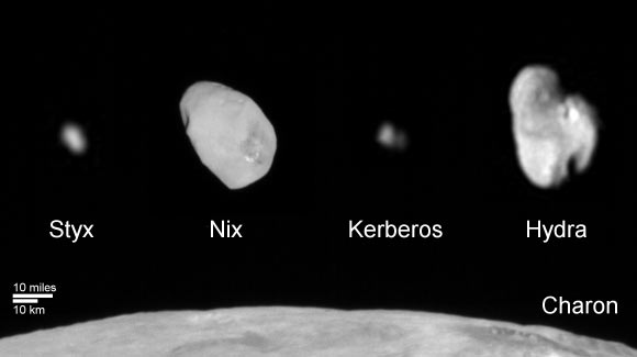 This composite image shows Charon and all four of Pluto’s small moons. All four small moons have highly elongated shapes, a characteristic thought to be typical of small bodies in the Kuiper Belt. Image credit: NASA / Johns Hopkins University Applied Physics Laboratory / Southwest Research Institute.