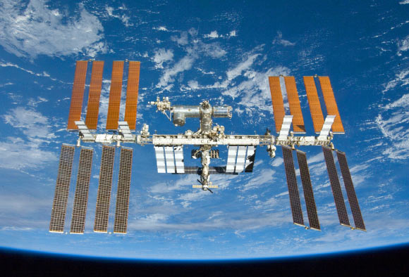 The International Space Station is featured in this image photographed by an STS-132 crew member on space shuttle Atlantis after the station and shuttle began their post-undocking relative separation. Undocking of the two spacecraft occurred on May 23, 2010, ending a seven-day stay that saw the addition of a new station module, replacement of batteries and resupply of the orbiting outpost. Image credit: NASA.