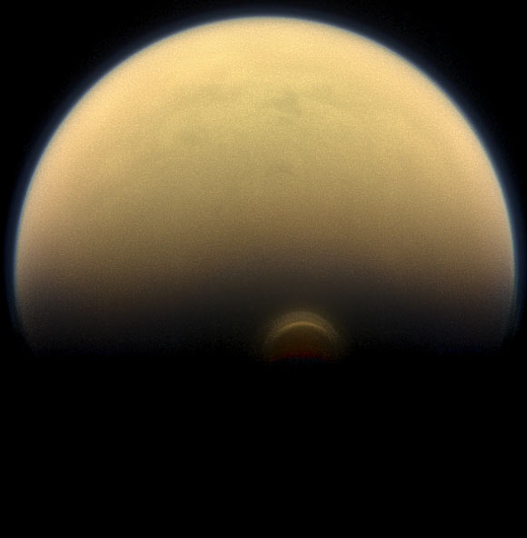 This Cassini image shows a giant cloud system in Titan’s atmosphere. Image credit: NASA / JPL-Caltech / Space Science Institute.