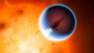 HD 189733b is shown here in front of its host star, HD 189733; a belt of wind around the equator of the planet travels at 5,400 mph from the heated day side to the night side. Image credit: Mark A. Garlick / University of Warwick.
