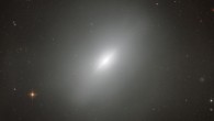 This dramatic image shows the Hubble’s view of a dynamically young lenticular galaxy known as NGC 3610, which lies 72 million light-years away. Image credit: NASA / ESA / Hubble / Judy Schmidt, www.geckzilla.com.