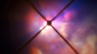 In this image from ESO’s Very Large Telescope (VLT) the red hypergiant star VY Canis Majoris is hidden behind an obscuring disc; the crosses are artifacts due to features in VLT’s SPHERE instrument. Image credit: ESO.