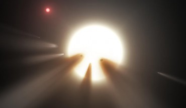 This illustration shows KIC 8462852 behind a shattered comet. Image credit: NASA / JPL-Caltech.