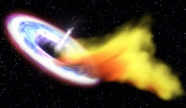 This artist’s impression shows a supermassive black hole consuming a star that has been torn apart by the black hole’s gravity; as a result of this ‘meal’ the black hole begins to launch a powerful jet that astronomers can detect with radio telescopes. Image credit: NASA / Goddard Space Flight Center / Swift.